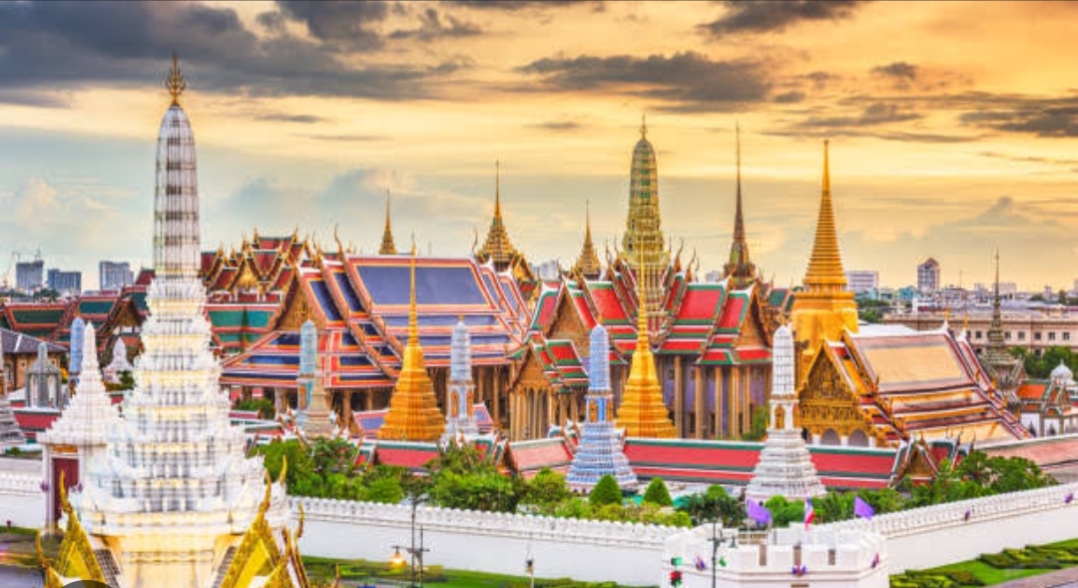 Grand Palace rooftops beside the Chao Phraya River in Bangkok